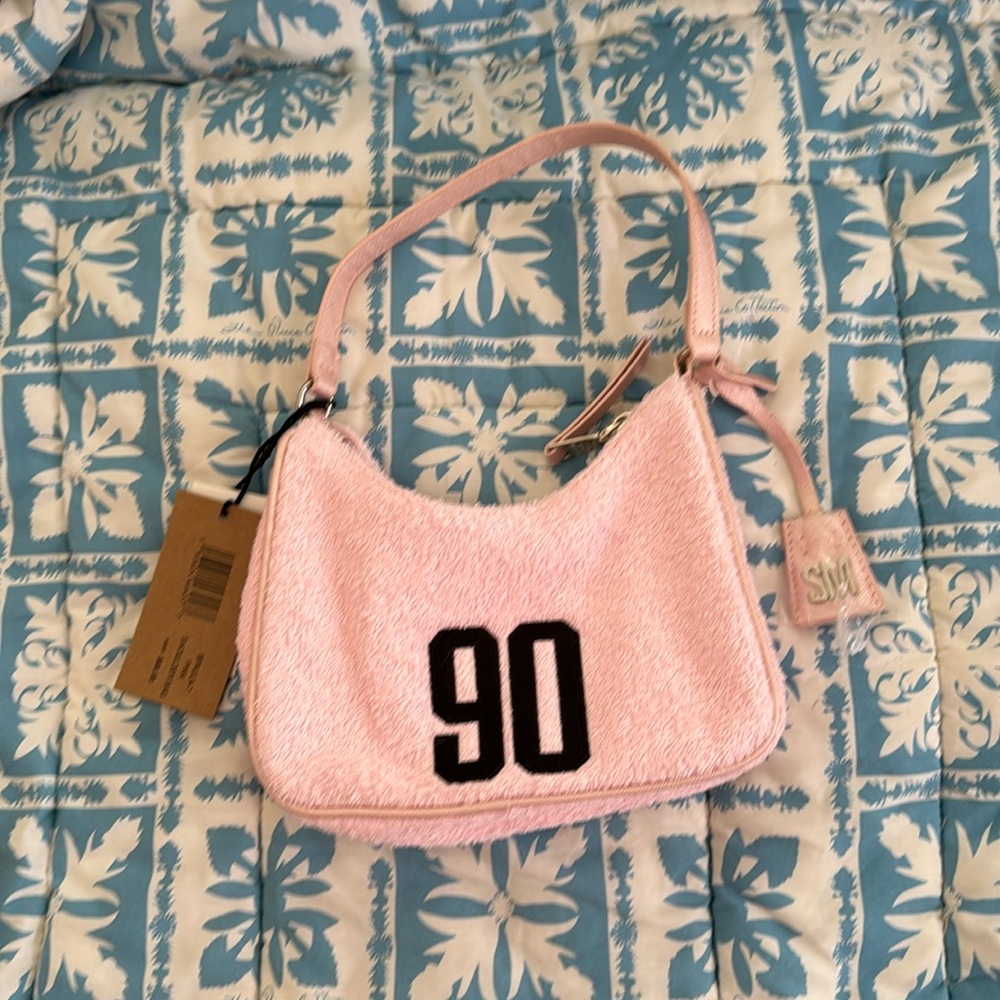 Steve Madden mini bag with the number 90 in Terry cloth light pink